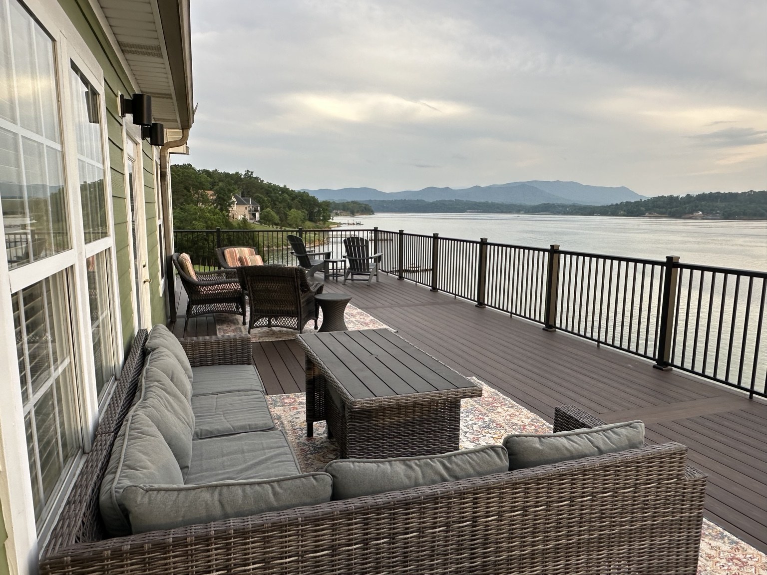 Comfortable deck seating beside the lake