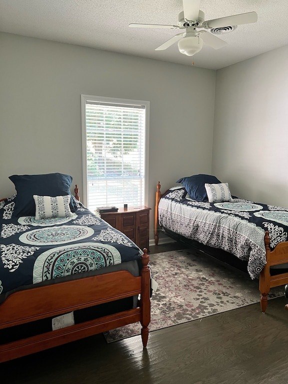 Upstairs twin bedroom with two twin beds